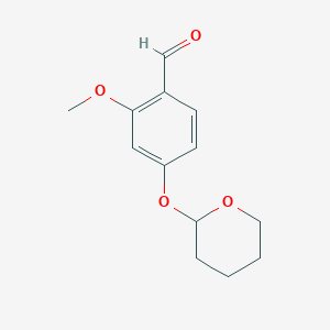 molecular formula C13H16O4 B066788 2-甲氧基-4-((四氢-2H-吡喃-2-基)氧基)苯甲醛 CAS No. 163041-68-7