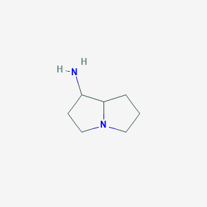 molecular formula C7H14N2 B066909 hexahydro-1H-pyrrolizin-1-amine CAS No. 170442-12-3