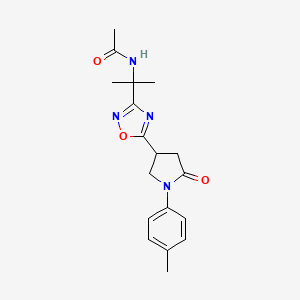 molecular formula C18H22N4O3 B6693691 N-[2-[5-[1-(4-methylphenyl)-5-oxopyrrolidin-3-yl]-1,2,4-oxadiazol-3-yl]propan-2-yl]acetamide 