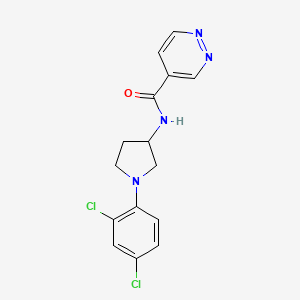molecular formula C15H14Cl2N4O B6698486 N-[1-(2,4-dichlorophenyl)pyrrolidin-3-yl]pyridazine-4-carboxamide 