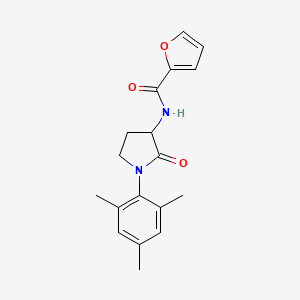 molecular formula C18H20N2O3 B6702094 N-[2-oxo-1-(2,4,6-trimethylphenyl)pyrrolidin-3-yl]furan-2-carboxamide 