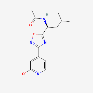 molecular formula C15H20N4O3 B6706598 N-[(1S)-1-[3-(2-methoxypyridin-4-yl)-1,2,4-oxadiazol-5-yl]-3-methylbutyl]acetamide 