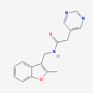 molecular formula C16H15N3O2 B6713831 N-[(2-methyl-1-benzofuran-3-yl)methyl]-2-pyrimidin-5-ylacetamide 