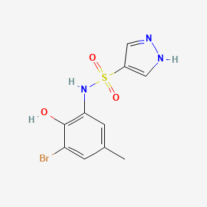 molecular formula C10H10BrN3O3S B6714210 N-(3-bromo-2-hydroxy-5-methylphenyl)-1H-pyrazole-4-sulfonamide 