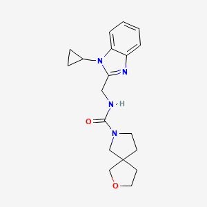 molecular formula C19H24N4O2 B6715395 N-[(1-cyclopropylbenzimidazol-2-yl)methyl]-2-oxa-7-azaspiro[4.4]nonane-7-carboxamide 