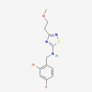 molecular formula C12H13BrFN3OS B6715792 N-[(2-bromo-4-fluorophenyl)methyl]-3-(2-methoxyethyl)-1,2,4-thiadiazol-5-amine 