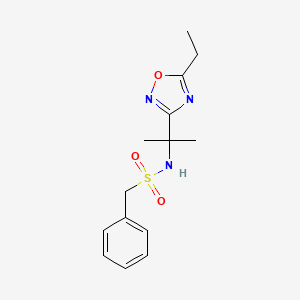 molecular formula C14H19N3O3S B6719304 N-[2-(5-ethyl-1,2,4-oxadiazol-3-yl)propan-2-yl]-1-phenylmethanesulfonamide 