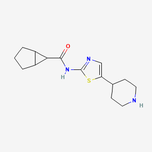 molecular formula C15H21N3OS B6725518 N-(5-piperidin-4-yl-1,3-thiazol-2-yl)bicyclo[3.1.0]hexane-6-carboxamide 