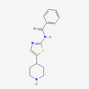 molecular formula C15H17N3OS B6725717 N-(5-piperidin-4-yl-1,3-thiazol-2-yl)benzamide 