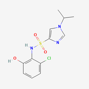 molecular formula C12H14ClN3O3S B6750312 N-(2-chloro-6-hydroxyphenyl)-1-propan-2-ylimidazole-4-sulfonamide 