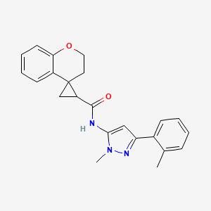 molecular formula C23H23N3O2 B6754637 N-[2-methyl-5-(2-methylphenyl)pyrazol-3-yl]spiro[2,3-dihydrochromene-4,2'-cyclopropane]-1'-carboxamide 
