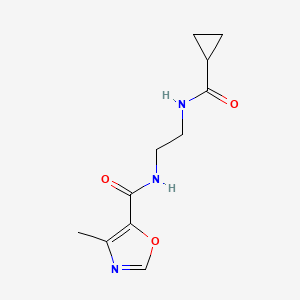molecular formula C11H15N3O3 B6754763 N-[2-(cyclopropanecarbonylamino)ethyl]-4-methyl-1,3-oxazole-5-carboxamide 