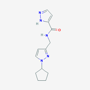 molecular formula C13H17N5O B6758473 N-[(1-cyclopentylpyrazol-3-yl)methyl]-1H-pyrazole-5-carboxamide 