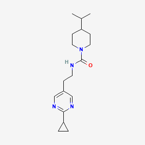 molecular formula C18H28N4O B6760289 N-[2-(2-cyclopropylpyrimidin-5-yl)ethyl]-4-propan-2-ylpiperidine-1-carboxamide 