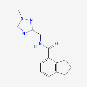 molecular formula C14H16N4O B6761780 N-[(1-methyl-1,2,4-triazol-3-yl)methyl]-2,3-dihydro-1H-indene-4-carboxamide 