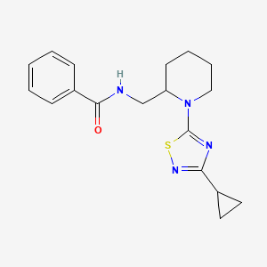molecular formula C18H22N4OS B6762343 N-[[1-(3-cyclopropyl-1,2,4-thiadiazol-5-yl)piperidin-2-yl]methyl]benzamide 