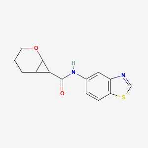 molecular formula C14H14N2O2S B6764102 N-(1,3-benzothiazol-5-yl)-2-oxabicyclo[4.1.0]heptane-7-carboxamide 