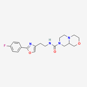 molecular formula C19H23FN4O3 B6765969 N-[2-[2-(4-fluorophenyl)-1,3-oxazol-4-yl]ethyl]-3,4,6,7,9,9a-hexahydro-1H-pyrazino[2,1-c][1,4]oxazine-8-carboxamide 