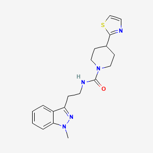 molecular formula C19H23N5OS B6768816 N-[2-(1-methylindazol-3-yl)ethyl]-4-(1,3-thiazol-2-yl)piperidine-1-carboxamide 