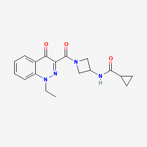 molecular formula C18H20N4O3 B6769610 N-[1-(1-ethyl-4-oxocinnoline-3-carbonyl)azetidin-3-yl]cyclopropanecarboxamide 