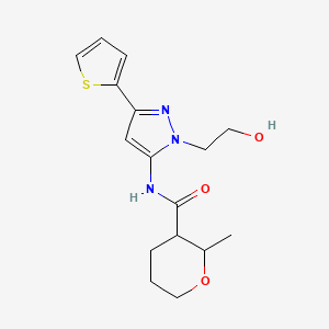 molecular formula C16H21N3O3S B6772961 N-[2-(2-hydroxyethyl)-5-thiophen-2-ylpyrazol-3-yl]-2-methyloxane-3-carboxamide 