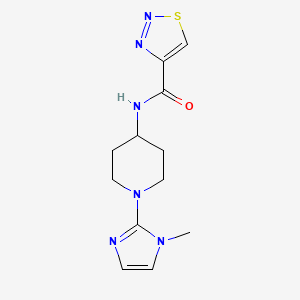 molecular formula C12H16N6OS B6774454 N-[1-(1-methylimidazol-2-yl)piperidin-4-yl]thiadiazole-4-carboxamide 