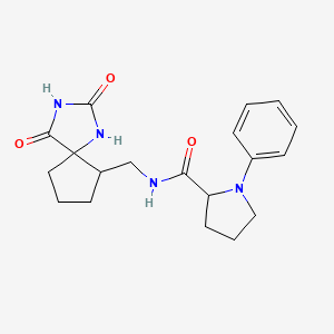 molecular formula C19H24N4O3 B6776329 N-[(2,4-dioxo-1,3-diazaspiro[4.4]nonan-9-yl)methyl]-1-phenylpyrrolidine-2-carboxamide 