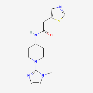 molecular formula C14H19N5OS B6778520 N-[1-(1-methylimidazol-2-yl)piperidin-4-yl]-2-(1,3-thiazol-5-yl)acetamide 