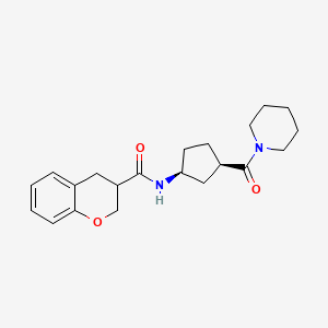 molecular formula C21H28N2O3 B6779676 N-[(1S,3R)-3-(piperidine-1-carbonyl)cyclopentyl]-3,4-dihydro-2H-chromene-3-carboxamide 