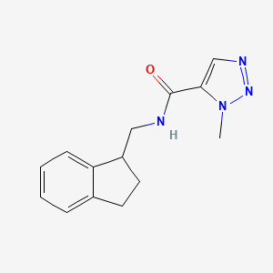 molecular formula C14H16N4O B6779922 N-(2,3-dihydro-1H-inden-1-ylmethyl)-3-methyltriazole-4-carboxamide 