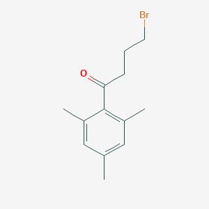 molecular formula C13H17BrO B067851 4-Bromo-1-(2,4,6-trimethylphenyl)butan-1-one CAS No. 175204-92-9