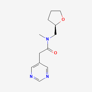 molecular formula C12H17N3O2 B6789422 N-methyl-N-[[(2R)-oxolan-2-yl]methyl]-2-pyrimidin-5-ylacetamide 