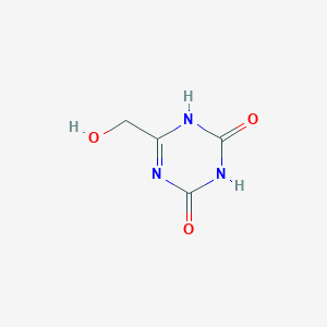 molecular formula C4H5N3O3 B067926 6-(Hydroxymethyl)-1,3,5-triazine-2,4(1H,3H)-dione CAS No. 180986-94-1