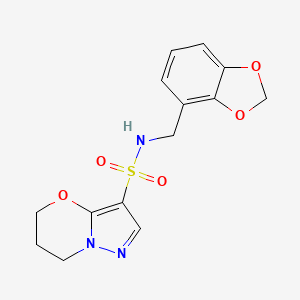 molecular formula C14H15N3O5S B6793613 N-(1,3-benzodioxol-4-ylmethyl)-6,7-dihydro-5H-pyrazolo[5,1-b][1,3]oxazine-3-sulfonamide 