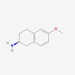 molecular formula C11H15NO B067939 (2S)-6-Methoxy-1,2,3,4-tetrahydronaphthalen-2-amine CAS No. 177017-69-5