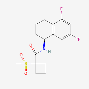 molecular formula C16H19F2NO3S B6796705 N-[(1S)-5,7-difluoro-1,2,3,4-tetrahydronaphthalen-1-yl]-1-methylsulfonylcyclobutane-1-carboxamide 