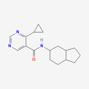molecular formula C17H23N3O B6798509 N-(2,3,3a,4,5,6,7,7a-octahydro-1H-inden-5-yl)-4-cyclopropylpyrimidine-5-carboxamide 