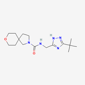 molecular formula C16H27N5O2 B6800773 N-[(3-tert-butyl-1H-1,2,4-triazol-5-yl)methyl]-8-oxa-2-azaspiro[4.5]decane-2-carboxamide 