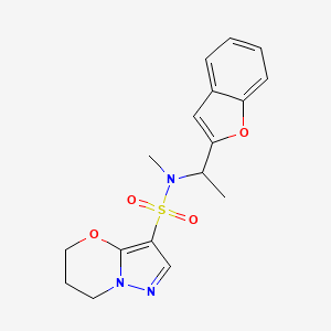 molecular formula C17H19N3O4S B6804112 N-[1-(1-benzofuran-2-yl)ethyl]-N-methyl-6,7-dihydro-5H-pyrazolo[5,1-b][1,3]oxazine-3-sulfonamide 