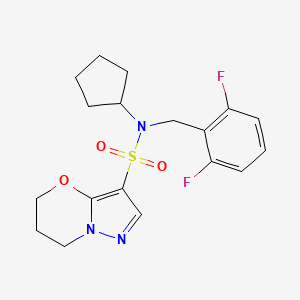 molecular formula C18H21F2N3O3S B6804142 N-cyclopentyl-N-[(2,6-difluorophenyl)methyl]-6,7-dihydro-5H-pyrazolo[5,1-b][1,3]oxazine-3-sulfonamide 