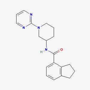 molecular formula C19H22N4O B6812651 N-(1-pyrimidin-2-ylpiperidin-3-yl)-2,3-dihydro-1H-indene-4-carboxamide 