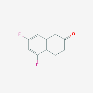 molecular formula C10H8F2O B068397 5,7-Difluoro-2-tetralone CAS No. 172366-38-0