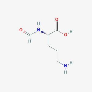 molecular formula C6H12N2O3 B068611 N~2~-Formyl-L-ornithine CAS No. 160200-90-8