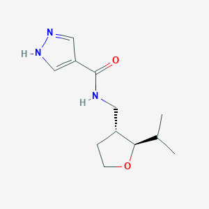 molecular formula C12H19N3O2 B6865716 N-[[(2R,3R)-2-propan-2-yloxolan-3-yl]methyl]-1H-pyrazole-4-carboxamide 
