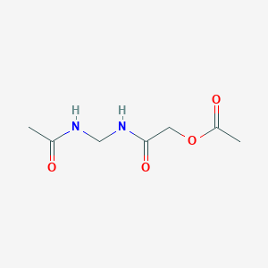 molecular formula C7H12N2O4 B068830 2-[(Acetamidomethyl)amino]-2-oxoethyl acetate CAS No. 194223-87-5
