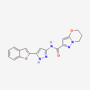 molecular formula C18H15N5O3 B6892778 N-[5-(1-benzofuran-2-yl)-1H-pyrazol-3-yl]-6,7-dihydro-5H-pyrazolo[5,1-b][1,3]oxazine-2-carboxamide 
