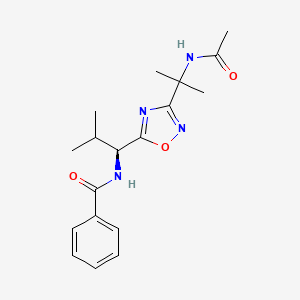 molecular formula C18H24N4O3 B6893182 N-[(1S)-1-[3-(2-acetamidopropan-2-yl)-1,2,4-oxadiazol-5-yl]-2-methylpropyl]benzamide 