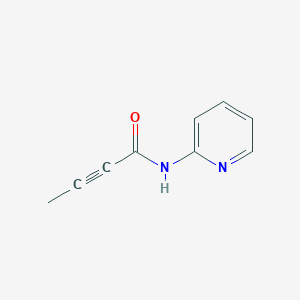 molecular formula C9H8N2O B6894455 n-(Pyridin-2-yl)but-2-ynamide 