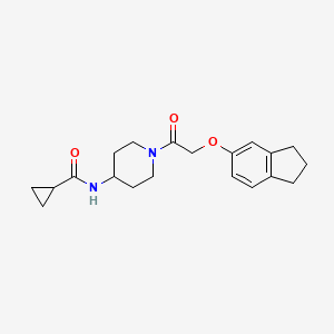 molecular formula C20H26N2O3 B6906640 N-[1-[2-(2,3-dihydro-1H-inden-5-yloxy)acetyl]piperidin-4-yl]cyclopropanecarboxamide 