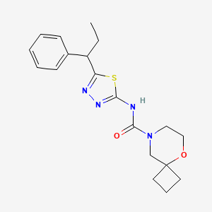 molecular formula C19H24N4O2S B6911724 N-[5-(1-phenylpropyl)-1,3,4-thiadiazol-2-yl]-5-oxa-8-azaspiro[3.5]nonane-8-carboxamide 